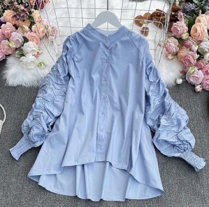 Blouse with ruched sleeves
