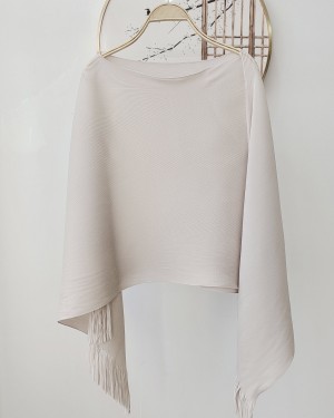 Pleated tassel cape
