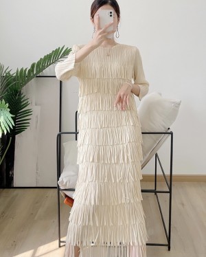 Pleated dress with tassel