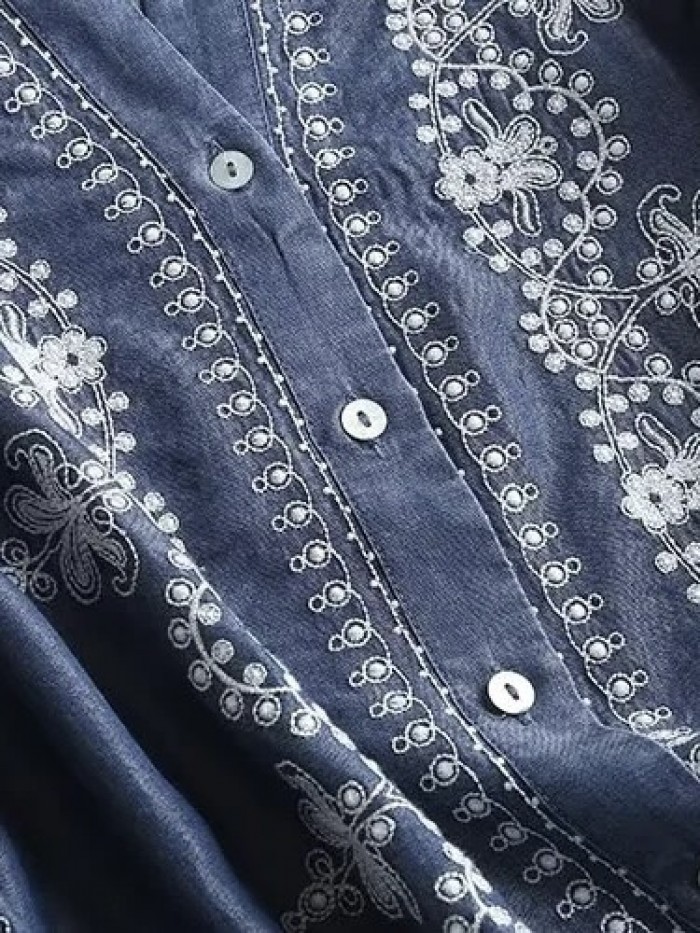Intricate embroidery motif denim blouse