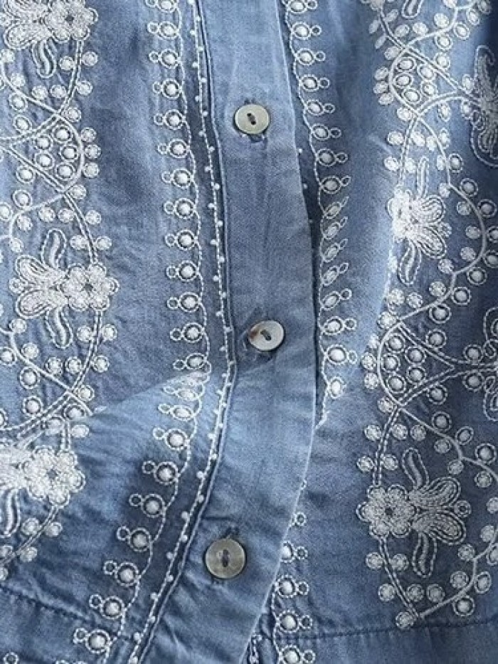 Intricate embroidery motif denim blouse