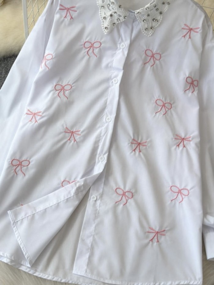 Bow motif button blouse