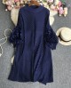 Pleated tunic with rosette