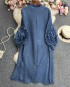 Pleated tunic with rosette