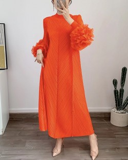 Pleated long dress with sheer sleeves