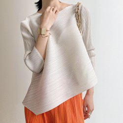 Pleated asymmetrical blouse